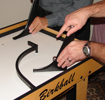 Controlling release with a forefinger