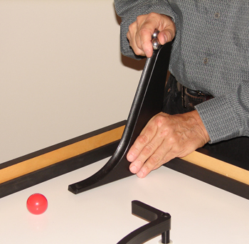 Using fingertips to release ball